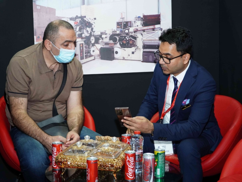 Meeting a customer at a tobacco machinery expo